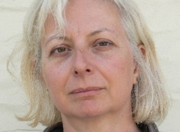 portrait photo of Dr Sara Downs