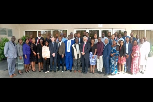 Image of a large group of individuals posing for a photograph