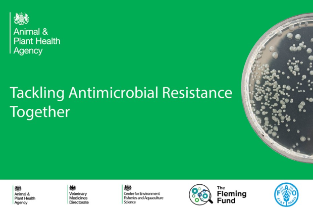 Image of bacteria growing in an agar plate with the text: Tackling Antimicrobial Resistance Together. The following logos also appear: APHA, VMD, Cefas, The Fleming Fund and FAO.