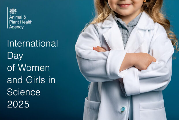 Young girl dressed in a white laboratory coat, arms folded next to the text, "International Day of Women and Girls in Science 2025." The APHA logo also shows.