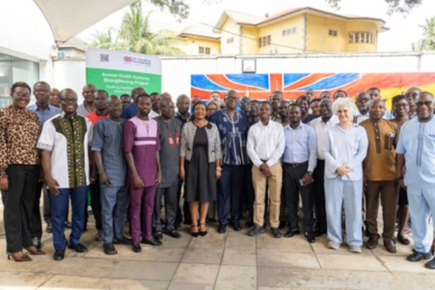Large group of people standing outside for a photograph.